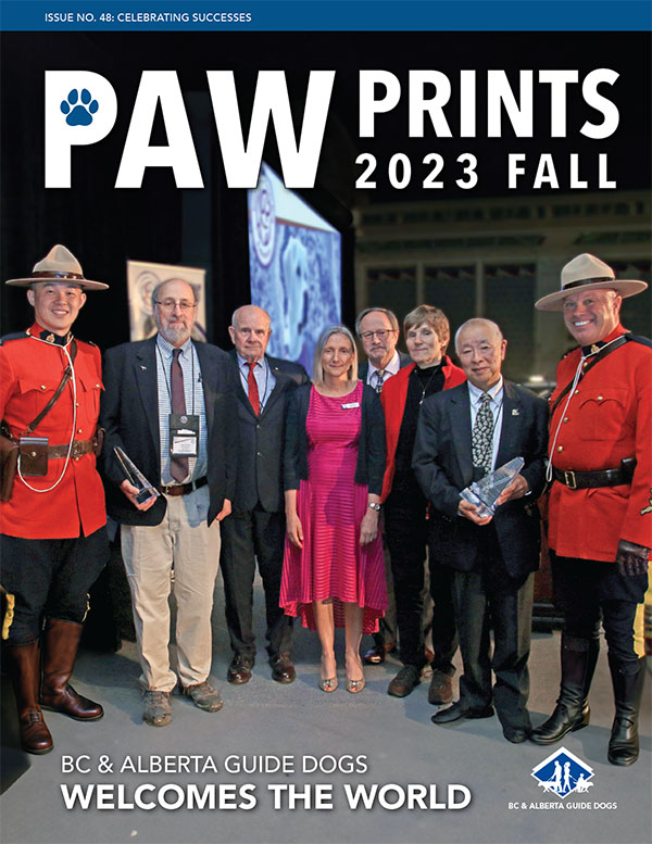 Group photo with Mounties and attendees.